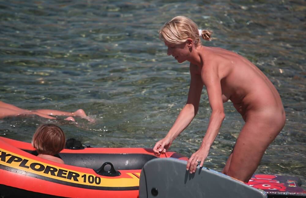 Red Boating for Two Nudists pics - Nudism strengthens friendships and mutual respect among people
