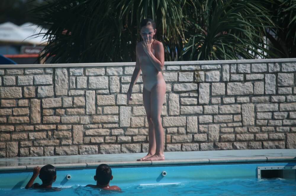 Naturist Pool-Side Singles photos - The concept of being without clothes