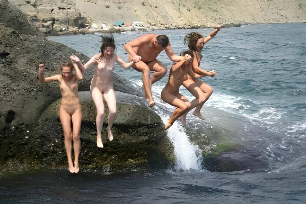 Mens and girls nudists on a beach - Only nudism and nothing else