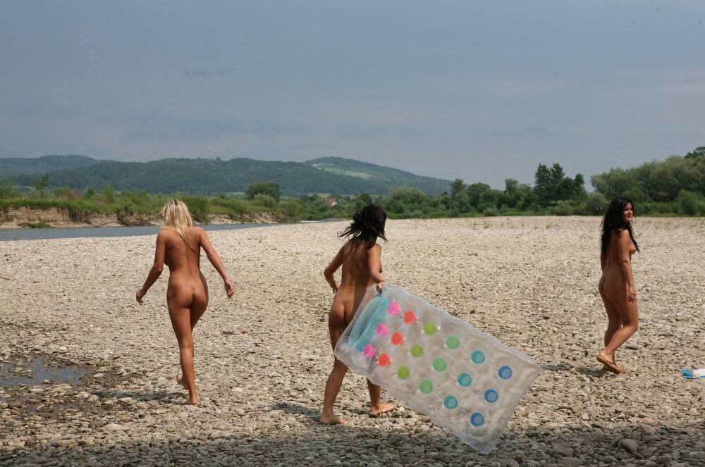 Naturist Park Floating On River photos - Living freely and naturally is the dream of naturists