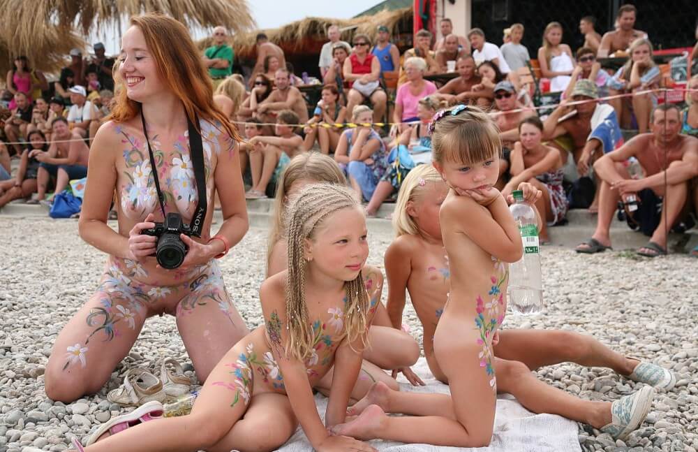Warm Sand Relaxation photos - People practice nudism to achieve harmony with nature
