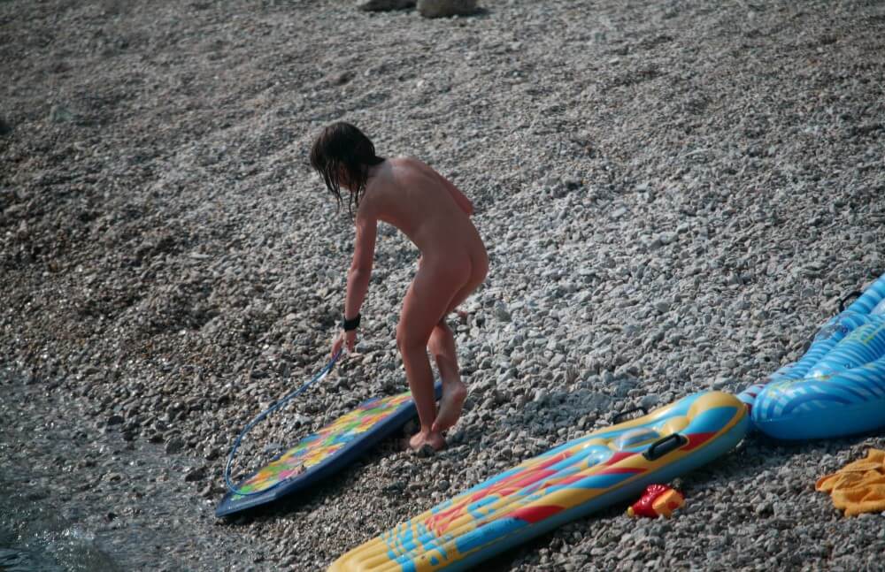 Naturist Surf Board Glides pics - Simplicity is an important part of naturists lives