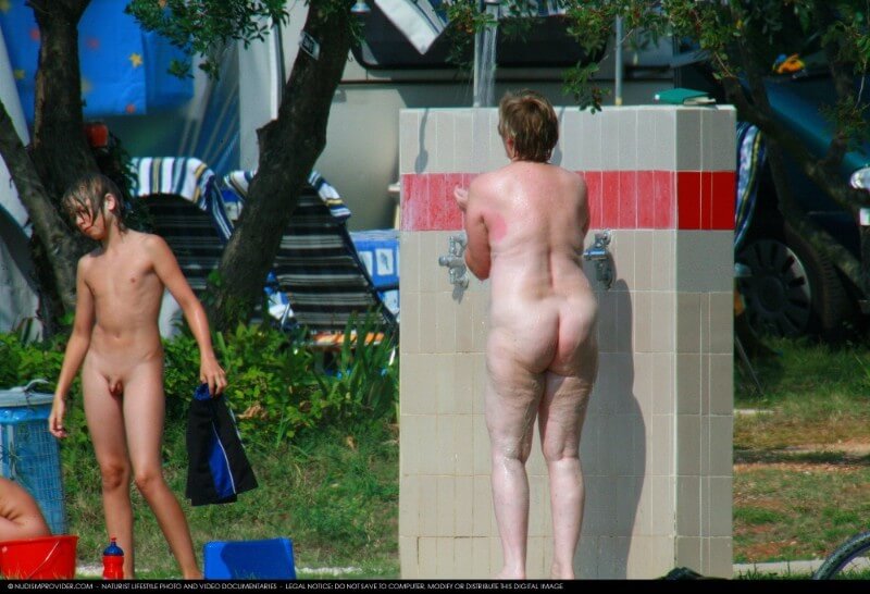 Covered in Towel Nudists-Boardwalk Biking - Nudism helps people accept themselves