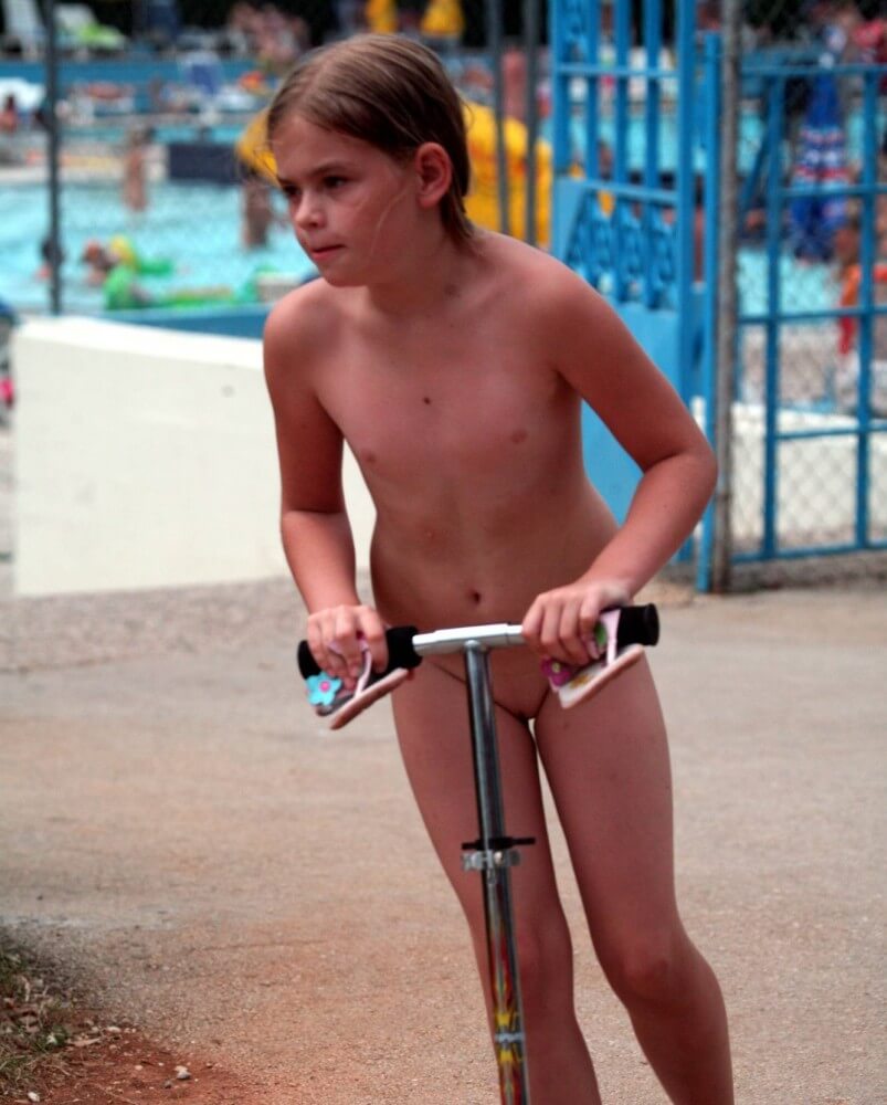 Pool-Side Naturist Scooter pics - Naturism is a path to self-understanding and self-acceptance