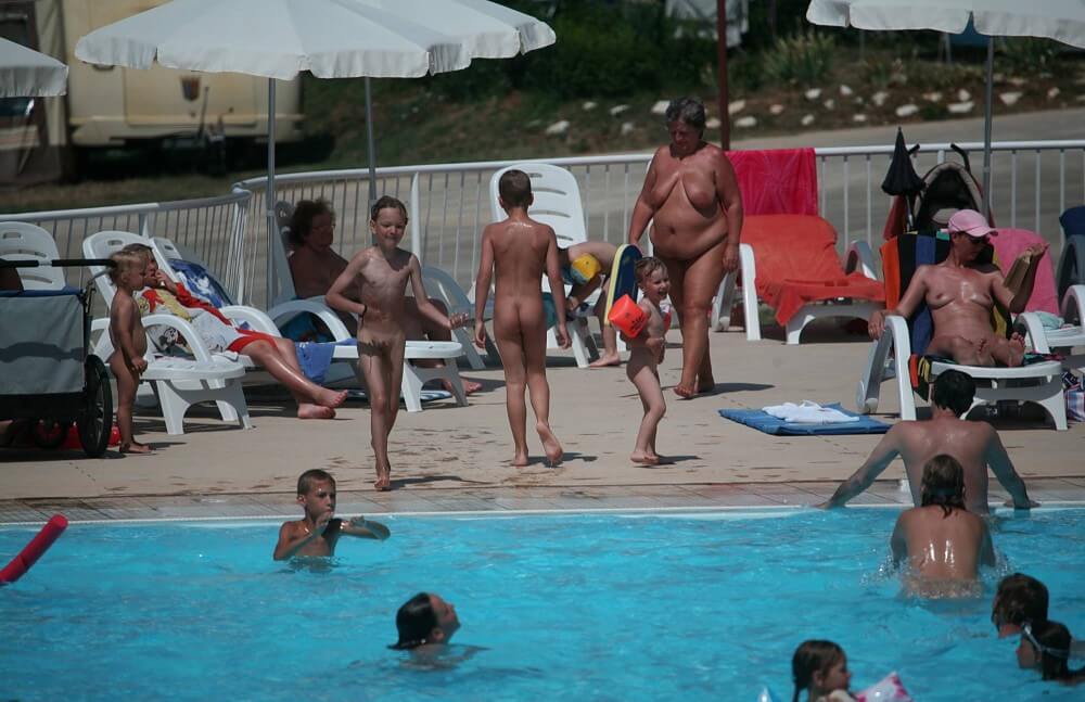 Naturist Afternoon Pool Games pics - People in a State of Complete Nudity