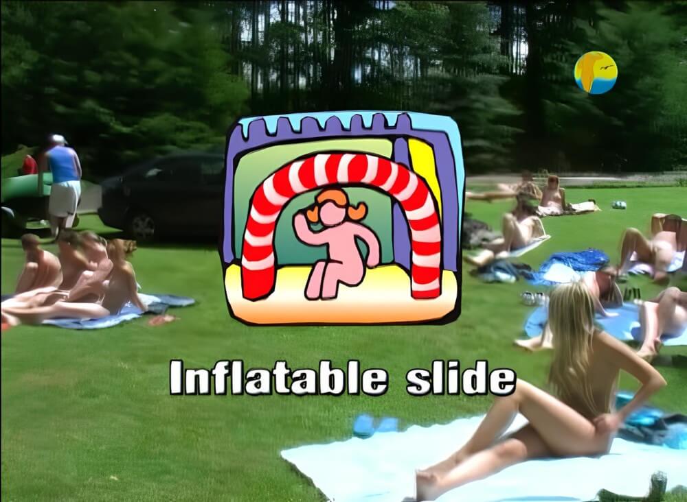 Naturist: Freedom: Inflatable Slide - Overcoming inhibitions is one of the goals of nudism