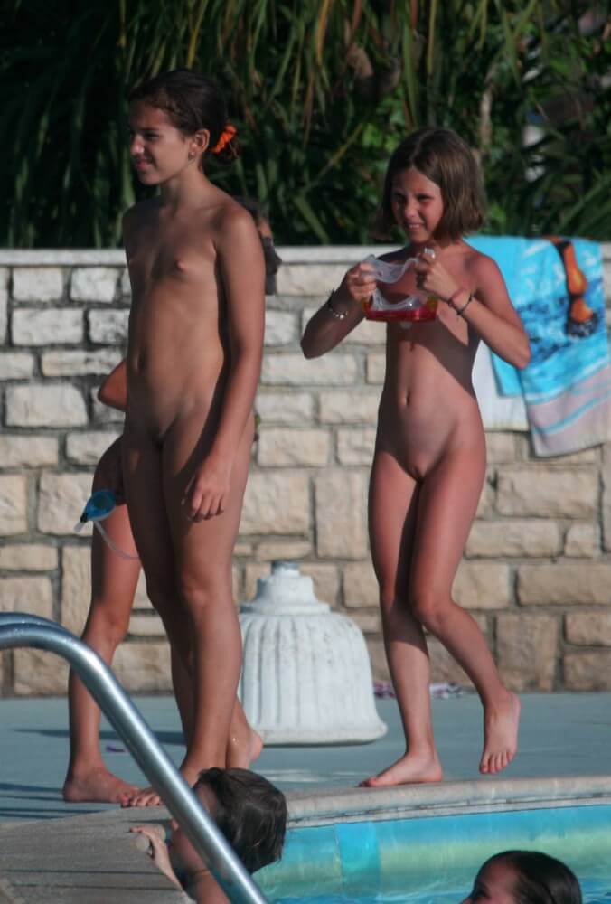 Two Poolside Nudist Girls pics - Looking at the sun and my own naked body