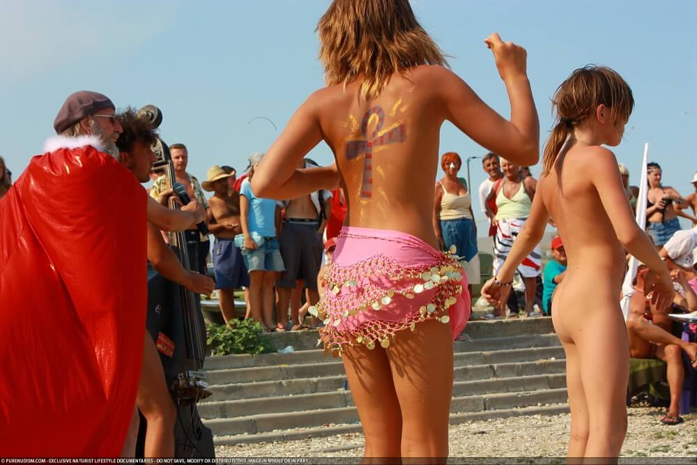 Colorful Carnival Dancing photos - It values honesty and sincerity in trusting the nudists around you